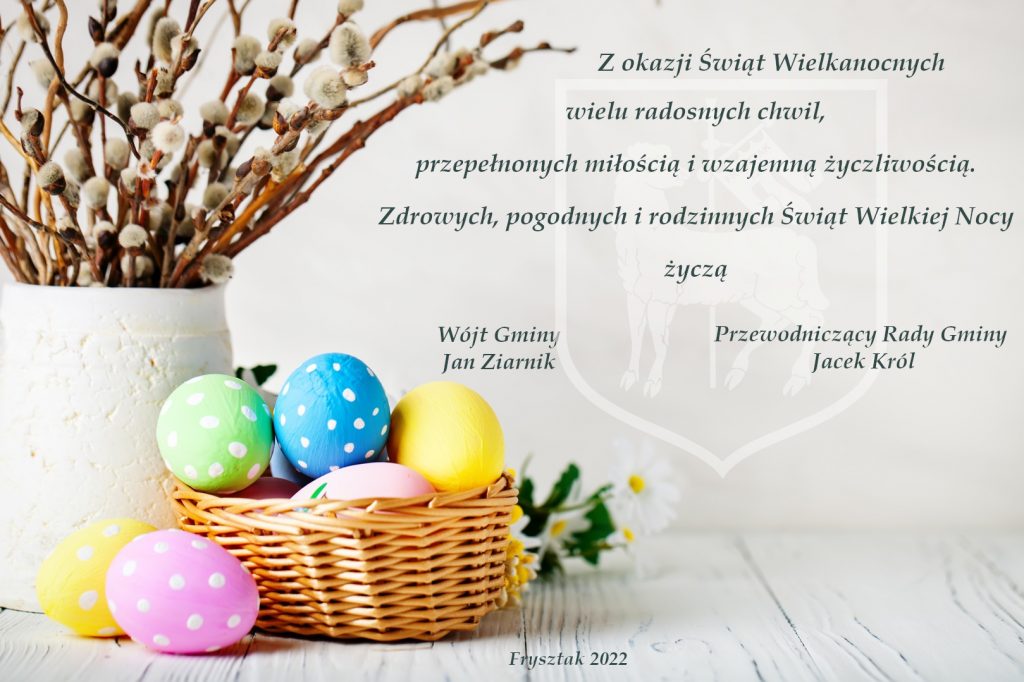 Na obrazie widoczny jest wazon z baziami i koszyczek z pisankami oraz życzenia Z okazji Świąt Wielkanocnych wielu radosnych chwil, przepełnionych miłością i wzajemną życzliwością. Zdrowych, pogodnych i rodzinnych Świąt Wielkiej Nocy życzą Wójt Gminy Jan Ziarniik Przewodniczący Rady Gminy Jacek Król 
